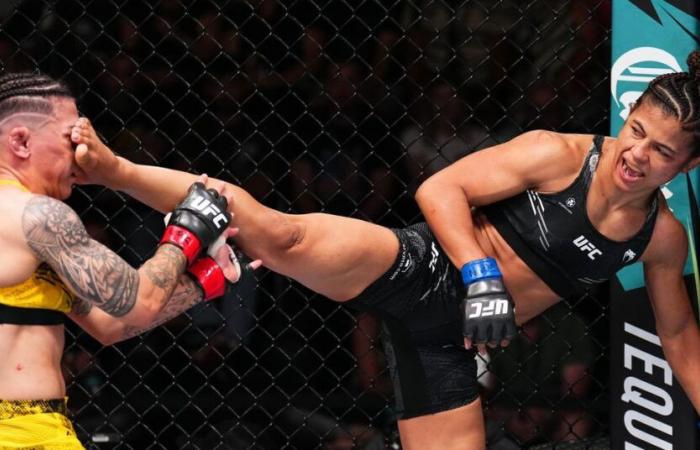 Natalia
      Silva
      setzt
      einen
      starken
      Clinch
      ein,
      um
      Jessica
      Andrade
      auszuschalten