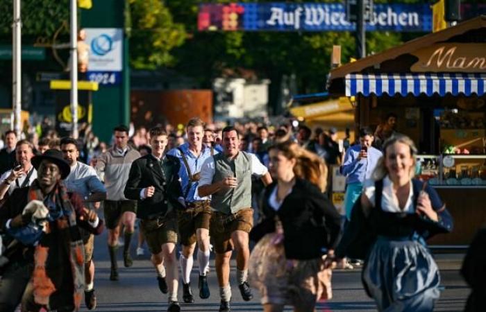 Die Eröffnung des Münchner Oktoberfests unter hohen Sicherheitsvorkehrungen in dreizehn Bildern