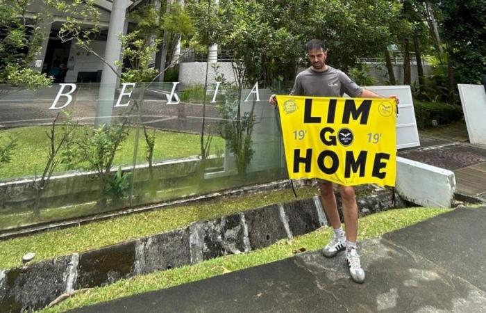 Zwei Unterstützer auf Hochzeitsreise zeichnen in Singapur Transparente gegen Peter Lim … und landen in Haft