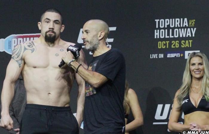 Khamzat Chimaev besiegte. Robert Whittaker bei UFC 308: Beste Fotos aus Abu Dhabi