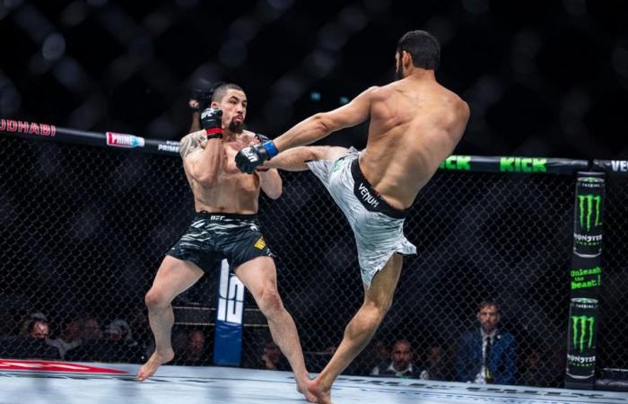 Khamzat Chimaev besiegte. Robert Whittaker bei UFC 308: Beste Fotos aus Abu Dhabi