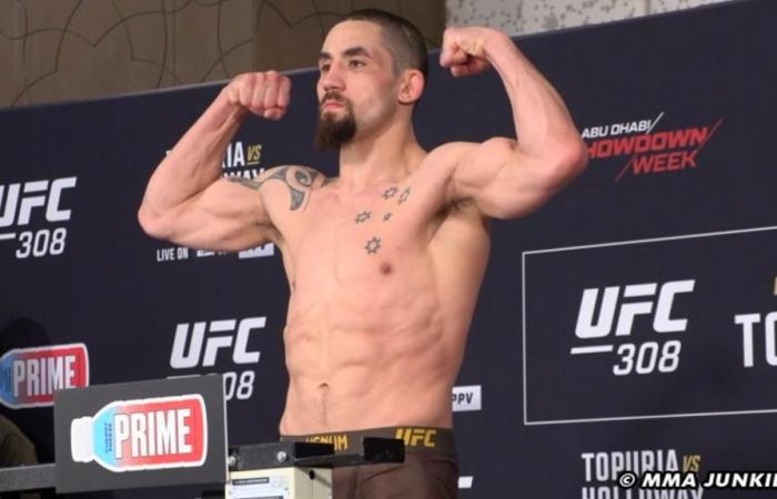 Khamzat Chimaev besiegte. Robert Whittaker bei UFC 308: Beste Fotos aus Abu Dhabi