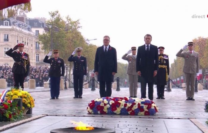 Emmanuel Macron und der britische Premierminister haben die Flamme der Erinnerung unter dem Arc de Triomphe neu entfacht