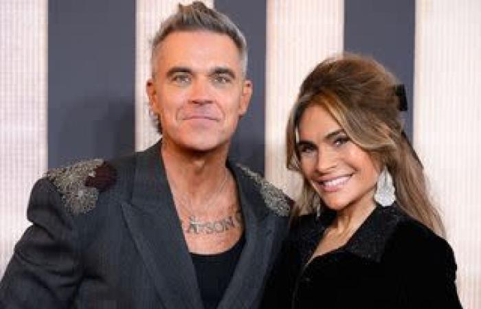 Robbie Williams scherzt, dass er „schwul sein will“, und nennt seine Frau in einem bizarren Interview einen „Bart“, 20 Jahre nachdem er die Zeitung wegen Gerüchten verklagt hat