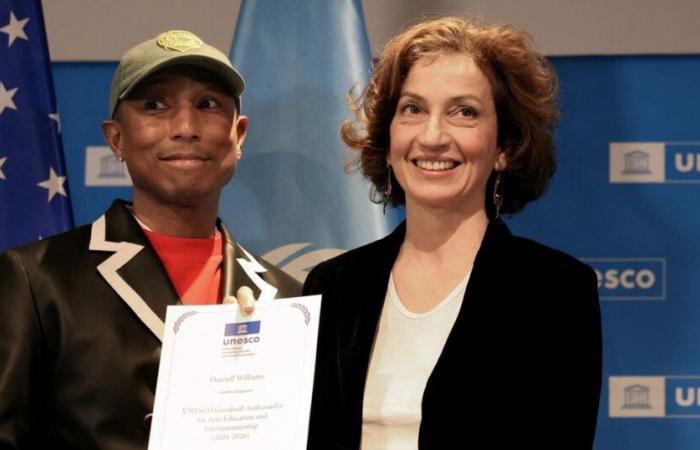 Neue wichtige Rolle für Pharrell Williams, er feiert sie mit seiner Frau Helen in einem Restaurant in Paris