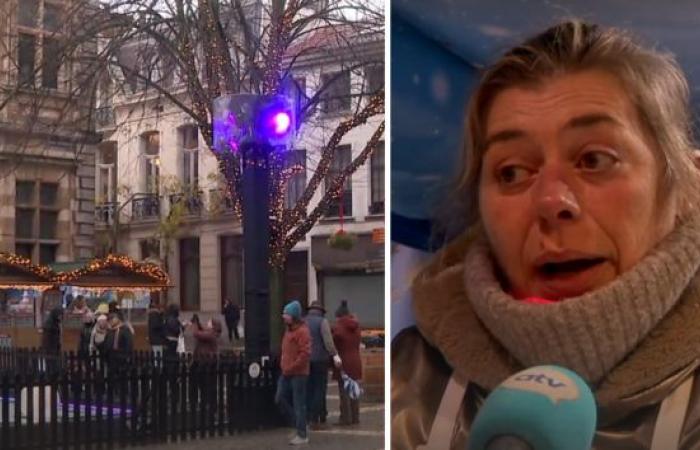 Kaum Menschen auf dem Conscienceplein während des Weihnachtsmarktes in Antwerpen, Marktverkäufer sehen schwarzen Schnee: „Vergessener Platz“ (Antwerpen)