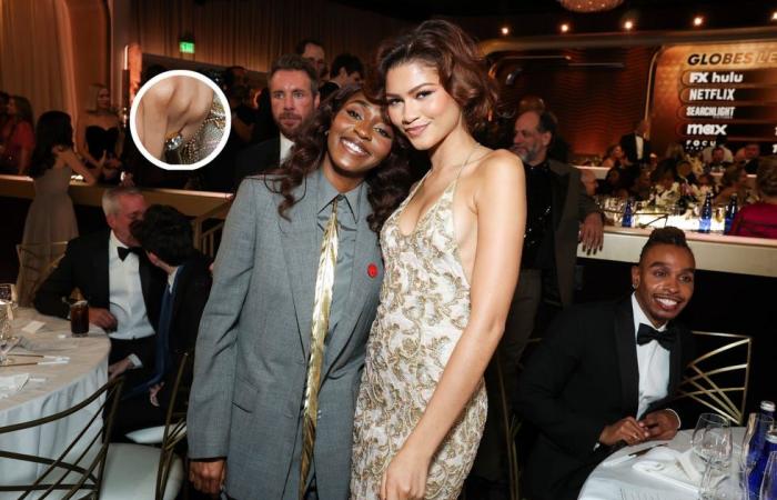 Zendaya bietet bei den Golden Globes 2025 den Preis für das Ballkleid mit der besten Kleidung in Orange an